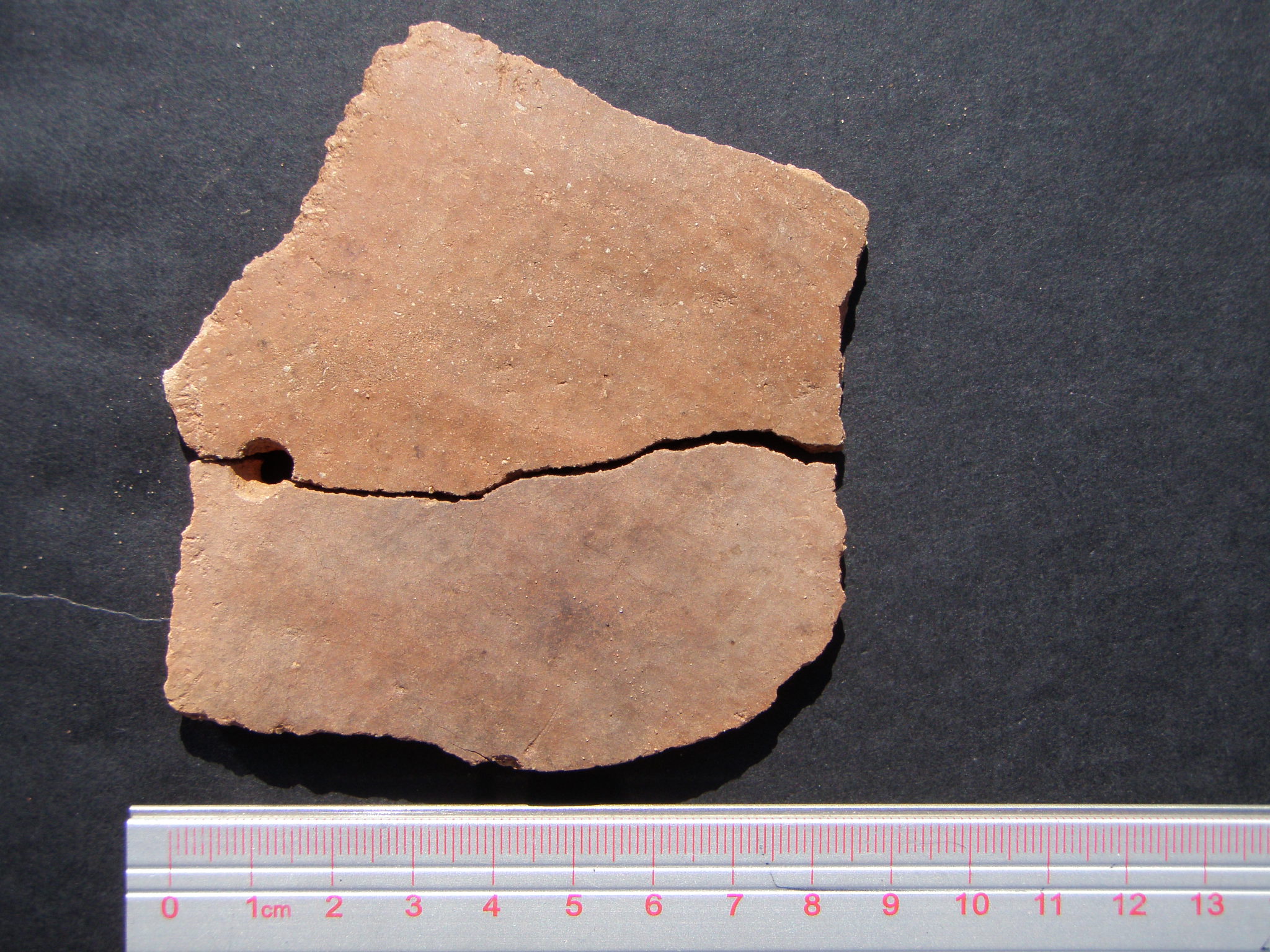 Refit Brownware Sherds with Drill Hole